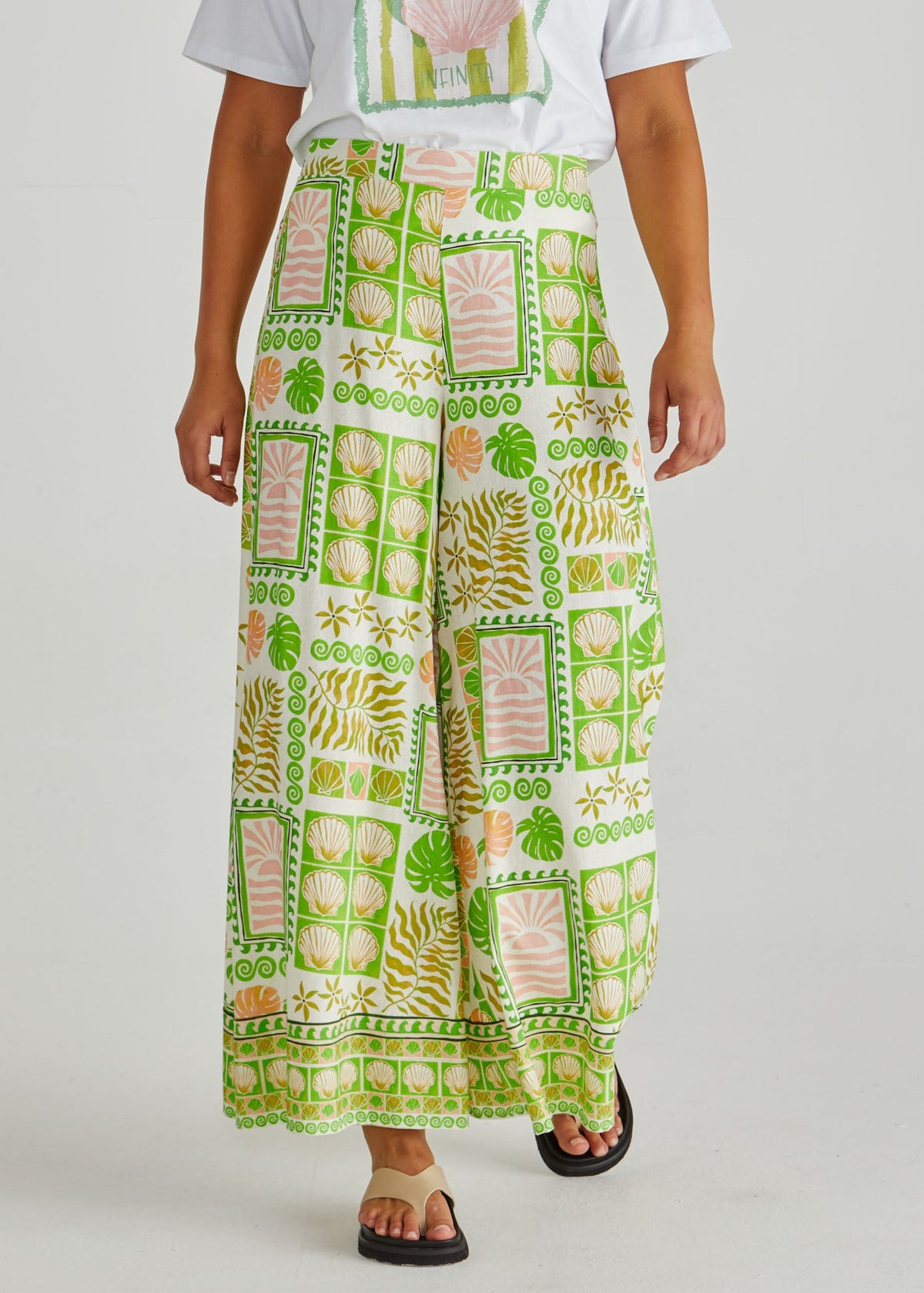 Close up of the SASS Emmett Wide Leg Pant in tropical shell print with flat front and side pockets. Available at Loloma Living, Tamborine Mountain.