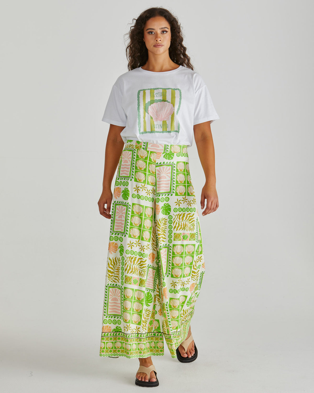 Full view of Lady wearing the SASS Cynthia Tee in exclusive seashell stripe print with dropped shoulder and soft cotton jersey. Available at Loloma Living Tamborine Mountain - stockist of SASS and Betty Basics.